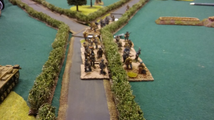 German advance down the road relentlessly carries on. Drawing MG and mortar fire.
